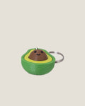 3D printed avocado clicker keychain with a smiling seed