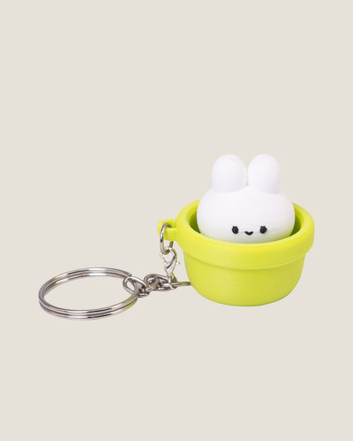 3D printed bunny in a pot clicker keychains in pink and green