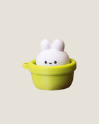 3D printed bunny in a pot clicker keychains in pink and green