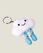 3D printed smiling cloud keychain with jiggly jointed legs