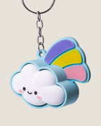 3D printed smiling cloud keychain with a pastel rainbow