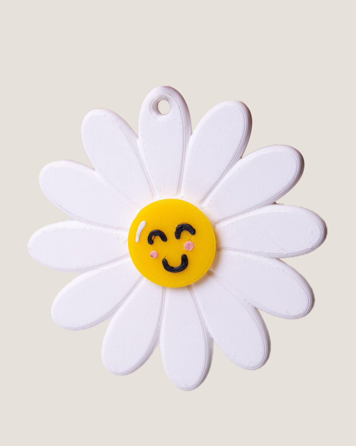 3D printed smiling daisy spinner keychain