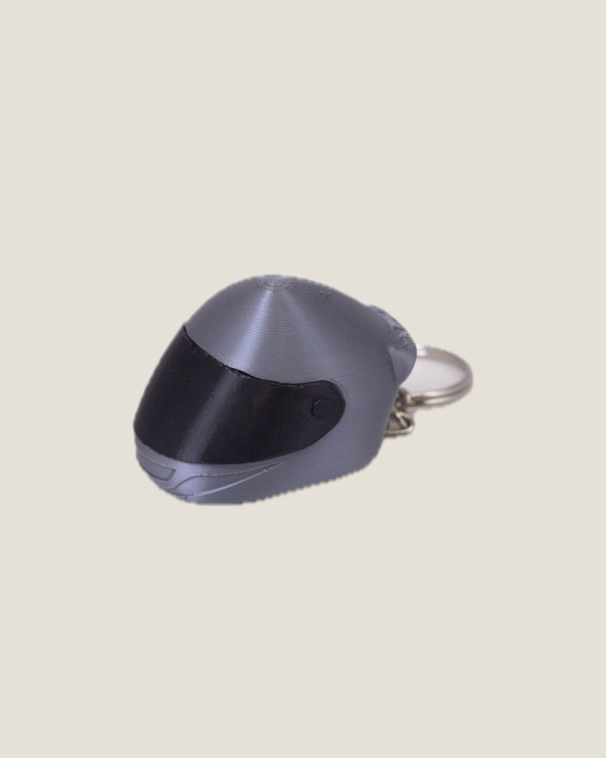 3D printed mini full-face motorcycle helmet keychain with flip-up visor