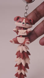 Fluffy Tail Cute Flexi Puppy Keychain — video